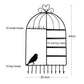 Black birdcage jewelry organizer showing earring holes and hanging hooks layout