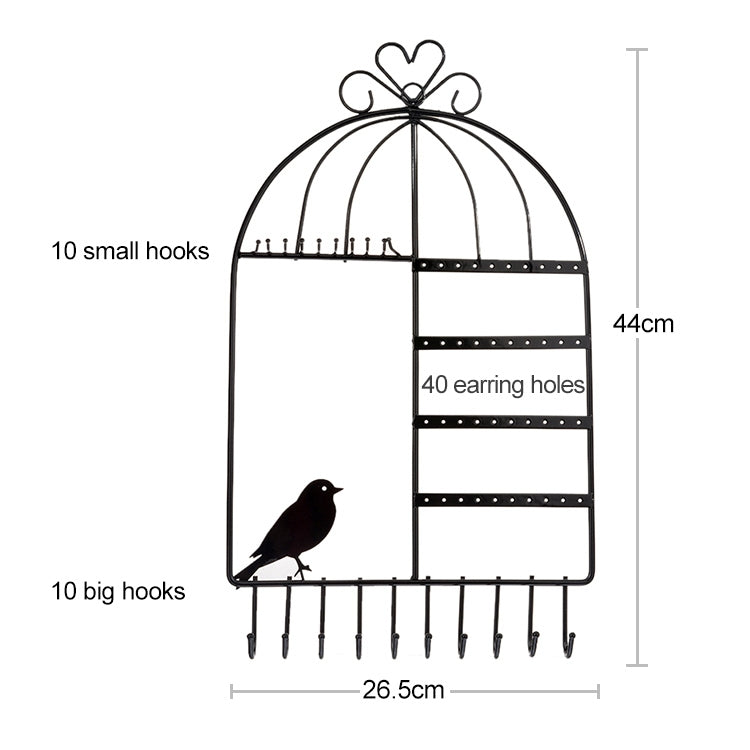 Black birdcage jewelry organizer showing earring holes and hanging hooks layout