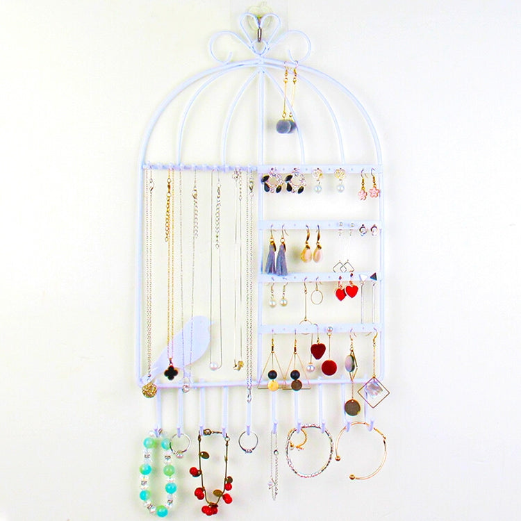 Light blue birdcage jewelry display rack with hanging necklaces, rings, and earrings