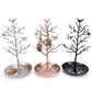 Bird tree jewelry display stand with bird charms, circular base, holds earrings and necklaces