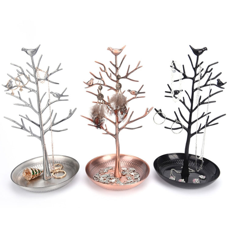 Bird tree jewelry display stand with bird charms, circular base, holds earrings and necklaces