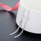 Silver ear hook fan tassel earrings with layered long chain tassels