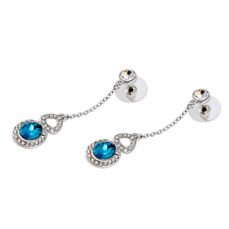 Silver-plated blue oval crystal chain drop earrings with small clear halo settings