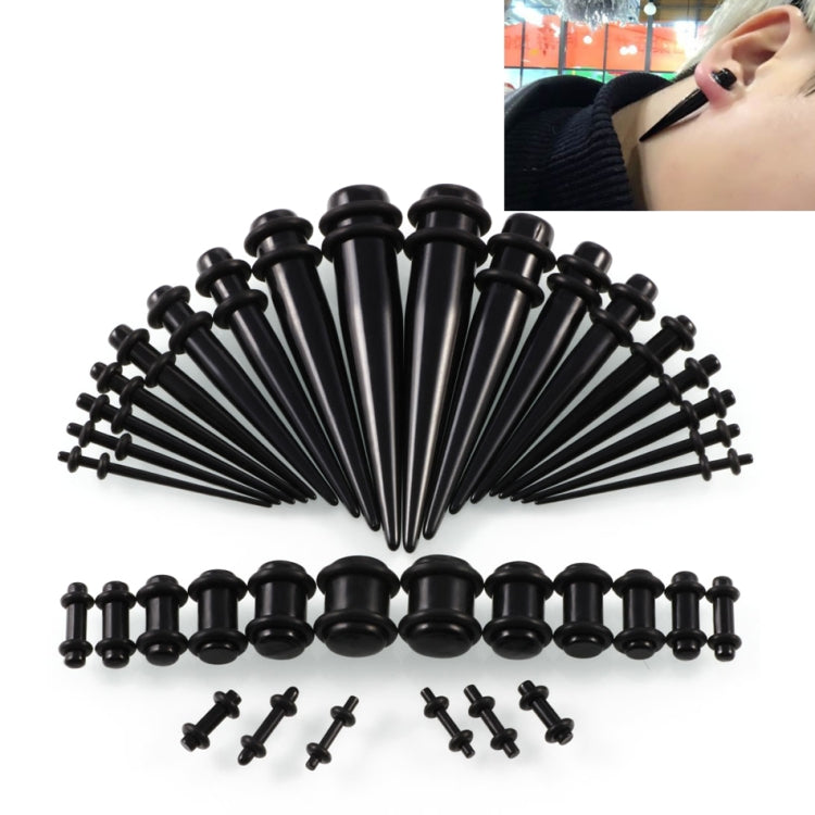 Black acrylic ear expansion gauge set with multiple sizes and matching black posts