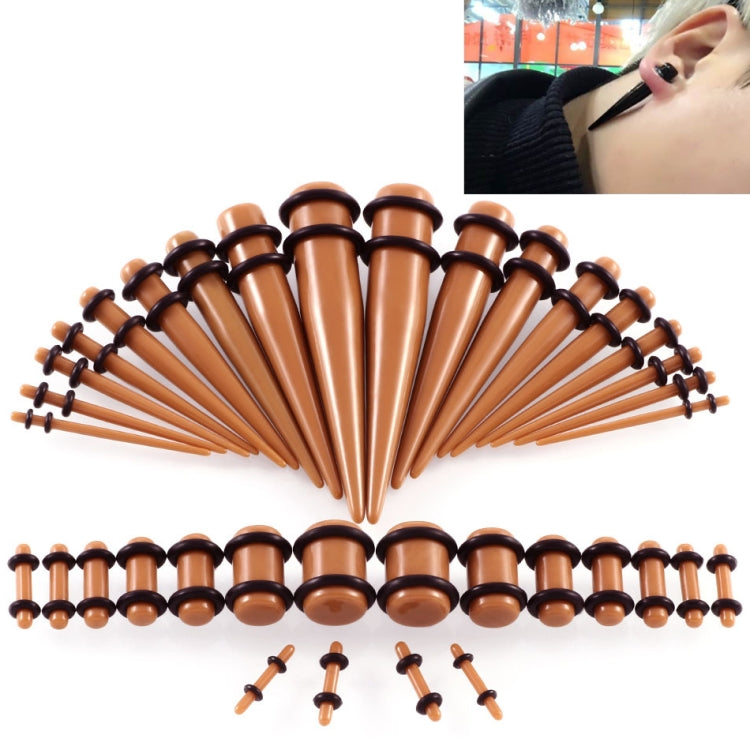 Brown acrylic ear expansion gauge set with black rims and straight insertion posts