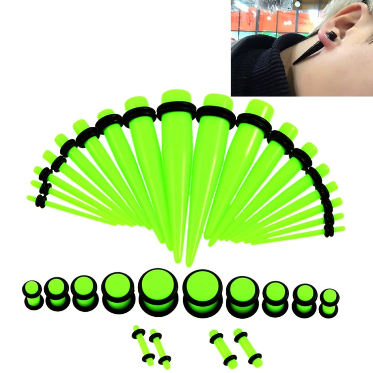 Acrylic ear expander set with neon green and black plugs and 14G–00G ear stretchers