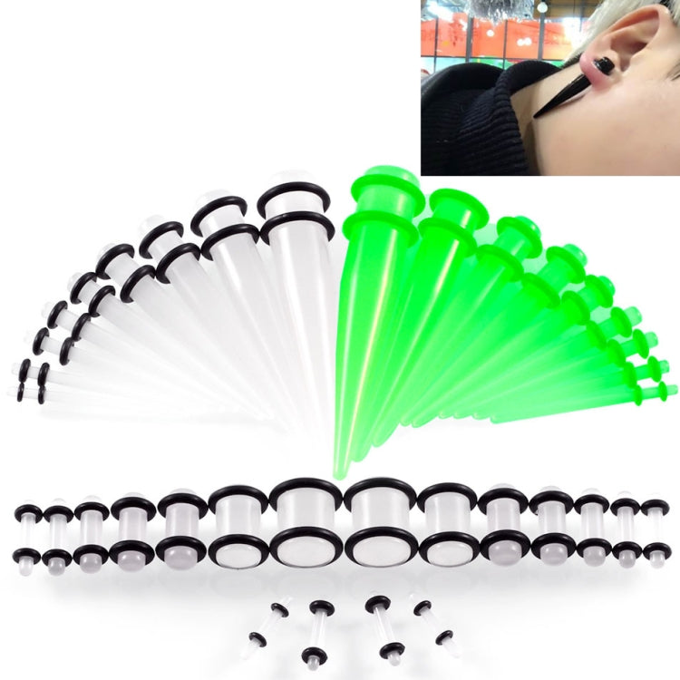 Green acrylic ear expansion gauge set with black rims and white plugs with posts