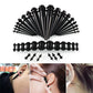 Acrylic ear expander set with black plugs and 14G–00G stretchers, shown on model