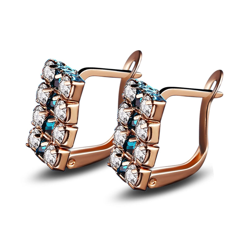 Rose-gold rectangle crystal stud earrings, side view with hinged back and white and blue stones