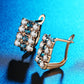 Rectangle crystal stud earrings in rose-gold with white and blue stones and hinged back
