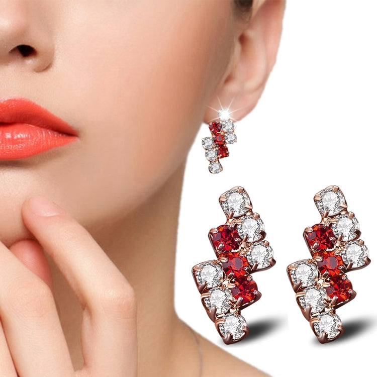 Crystal cluster stud earrings with red and clear stones in rose gold-tone setting