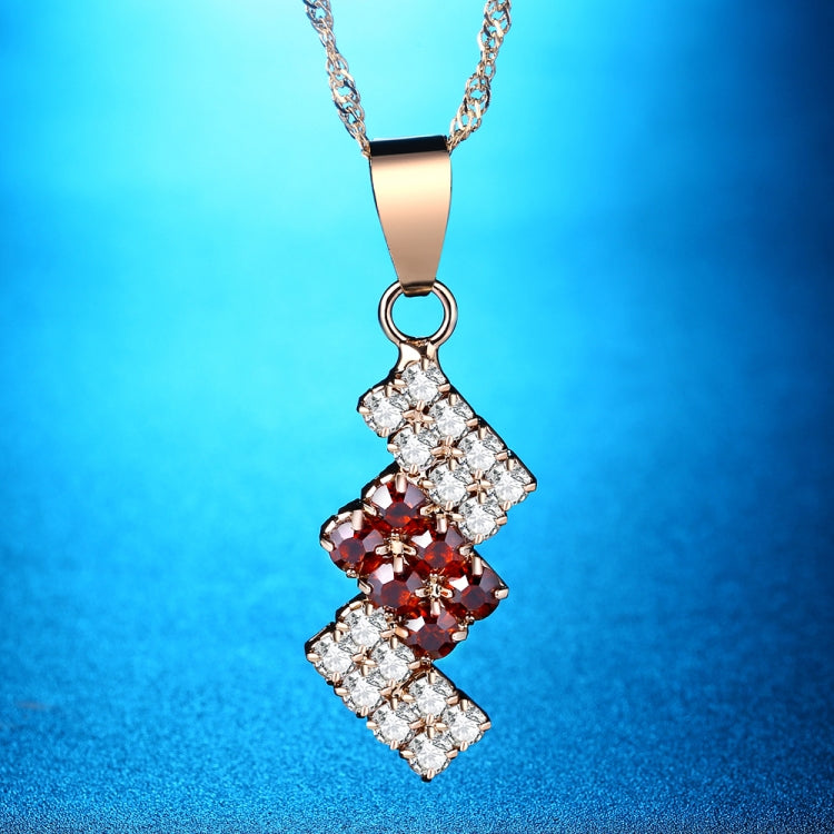 Gold-plated crystal pendant necklace with red and clear geometric drop on chain