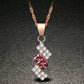 Gold-plated crystal pendant necklace with red center and clear square accents