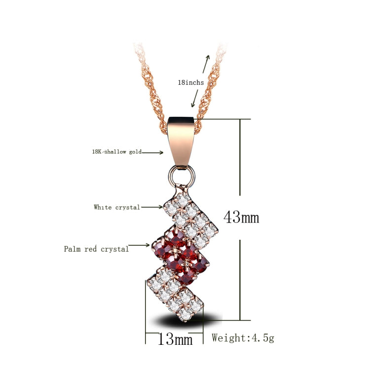 Gold-plated crystal pendant necklace with irregular red crystal and clear stones