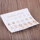 12-pair stud earring set card featuring assorted small round, triangle, pearl, and gold studs