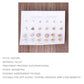 12-pair stud earring jewelry set on card with mixed geometric, pearl, and crystal-look studs