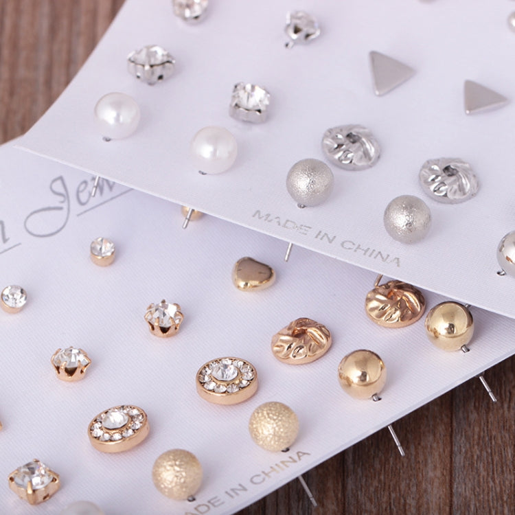 Assorted stud earrings on card, including pearl-look, rhinestone, gold, and textured ball designs