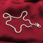 Silver plated star-shaped charm anklet on a thin chain with lobster clasp