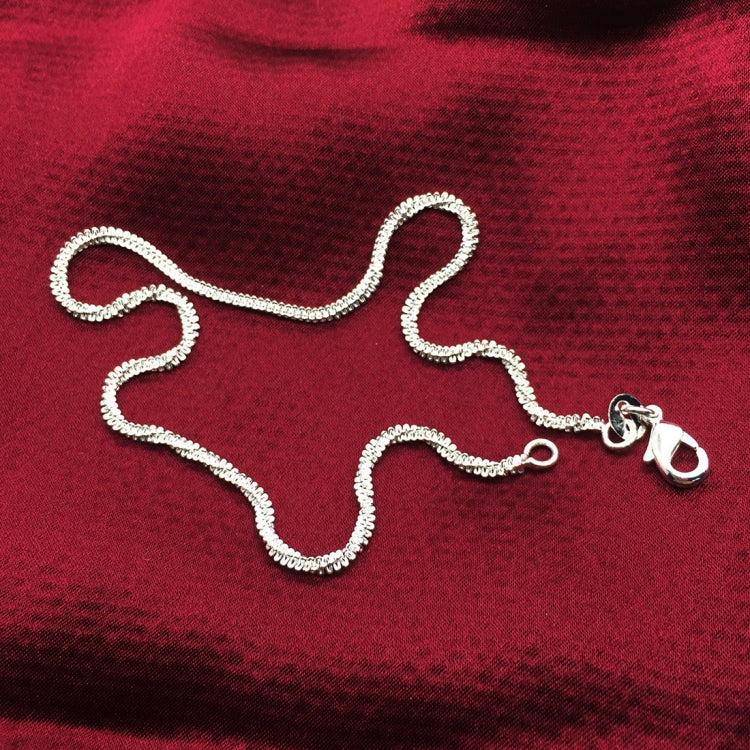 Silver plated star-shaped charm anklet on a thin chain with lobster clasp