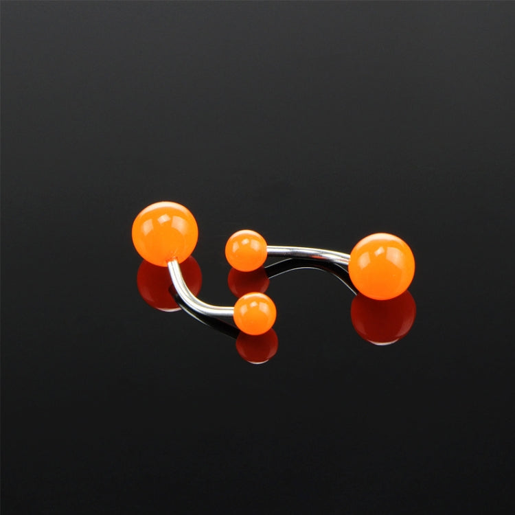Fluorescent acrylic belly button ring with three orange glowing balls and silver bar