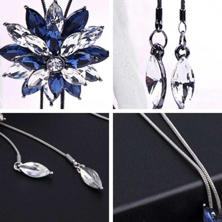 Blue and clear rhinestone flower necklace with marquise drop earrings, silver tone