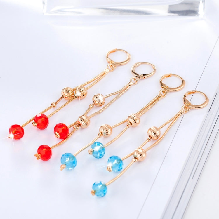 Gold-tone crystal tassel earrings with red and blue crystal drops, set of pairs