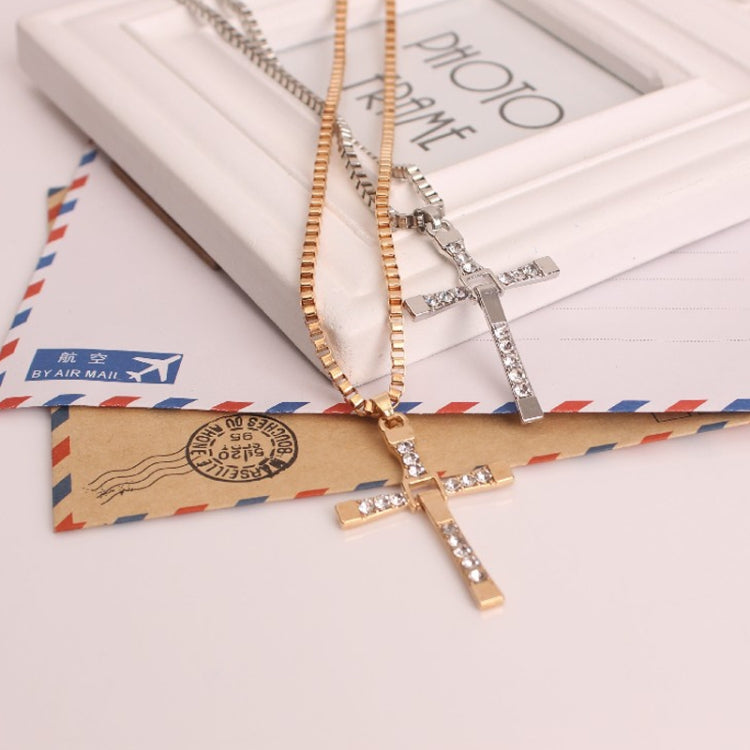 Two cross pendant necklaces with gold and silver rhinestone pendants