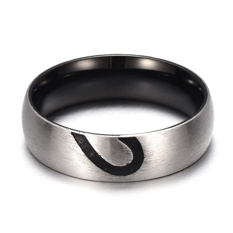 Silver-tone ring with black heart design and smooth inner band