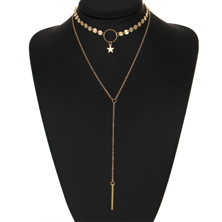 Gold double-layer necklace with star charm and long bar tassel on oval links