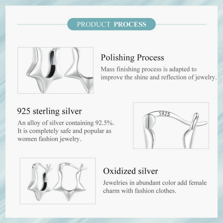 Sterling silver star ear clips detail with S925 mark and dark oxidized finish