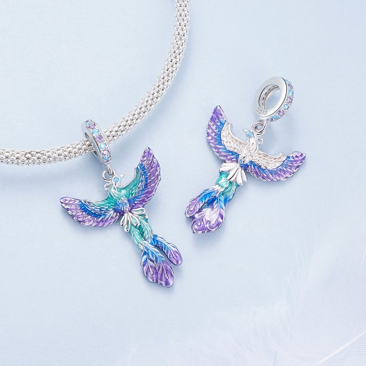 Two phoenix pendant charms on silver chain, rainbow enamel wings and CZ accents