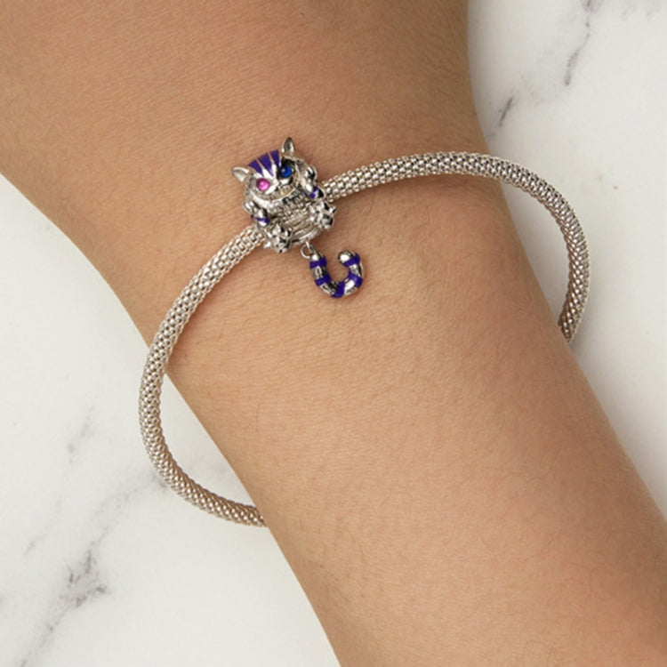 Sterling silver cat charm on a mesh bracelet chain with purple-and-blue striped tail