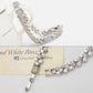 Platinum-plated zircon bracelet with clustered round stones and a clasp