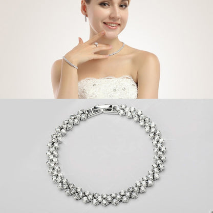 Zircon-encrusted tennis bracelet with round rhinestone links and silver-tone clasp