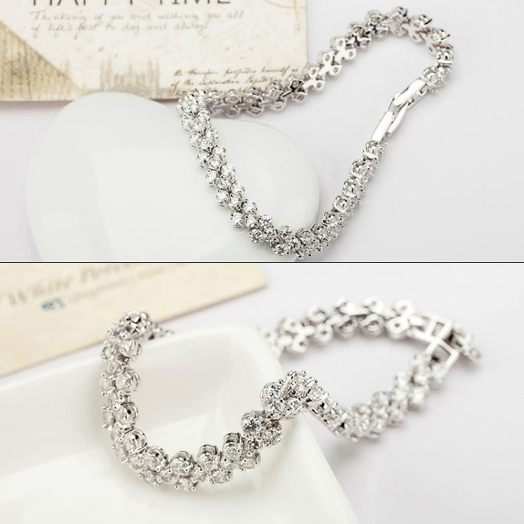 Stone tennis bracelet with shimmering zircon links and silver-tone clasp