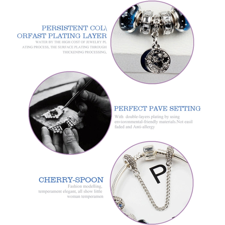 Close-up details of a silver-tone beaded charm bracelet with round blue and star charms