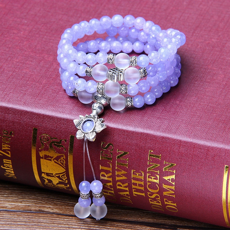 Lavender beaded bracelet set with flower charm and dangling elephant figure charm