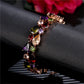 Rose gold multicolor zircon stone bracelet with prong settings and hinged clasp