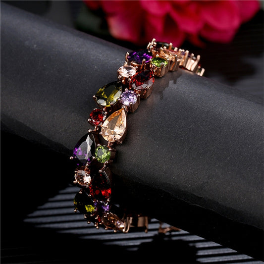 Rose gold multicolor zircon stone bracelet with prong settings and hinged clasp