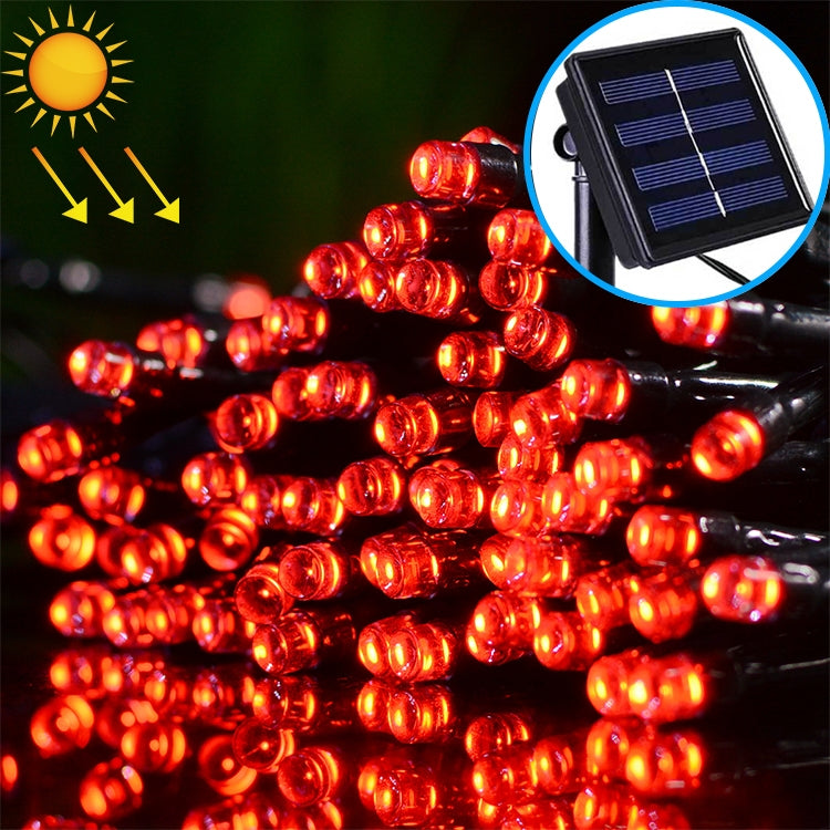 Solar LED string lights with red round bulbs and black solar panel for outdoor use