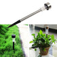 Solar garden stake light with stainless steel tube, clear lens, and black pointed base