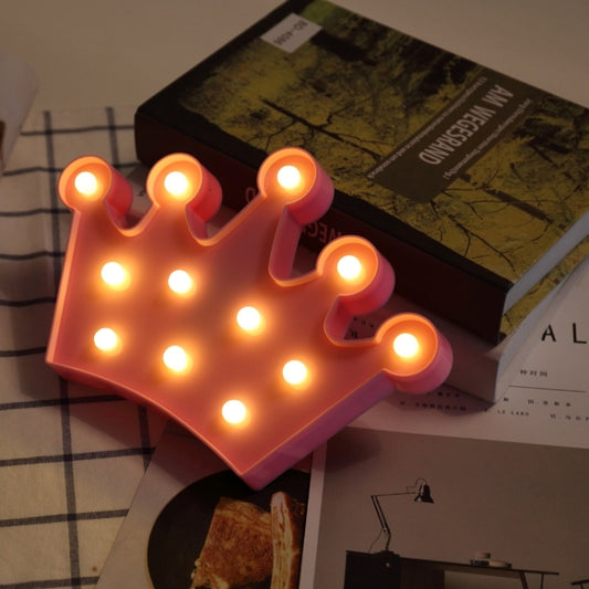 Pink crown LED night light with glowing bulbs, battery-powered table lamp