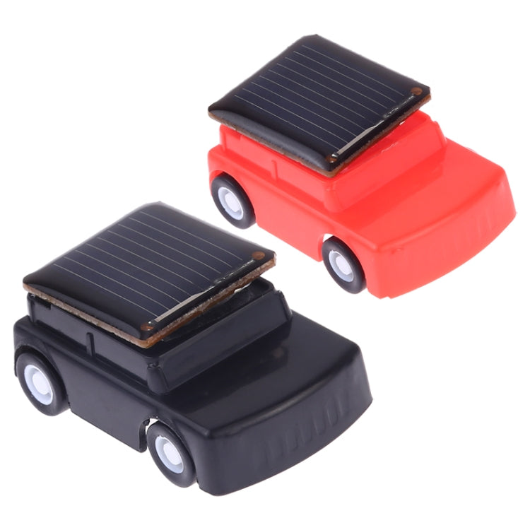 Red and black solar jeep toy cars, top solar panels visible
