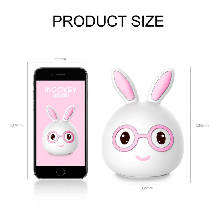 Rabbit LED decoration lamp with size diagram beside a smartphone for scale