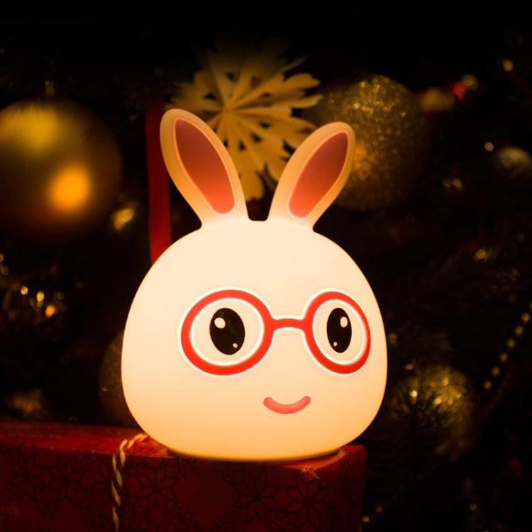 Glowing rabbit LED decoration lamp with warm white face, orange ears, smiling