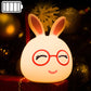 Battery LED rabbit night lamp with red-orange glowing eyes and smiling glasses face