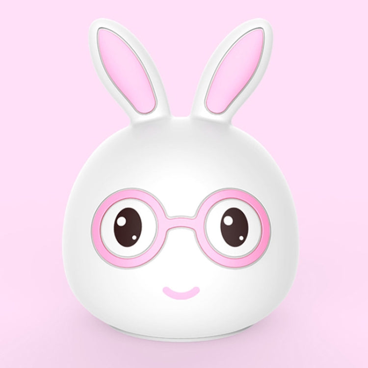 White bunny LED lamp with pink inner ears and pink glasses, smiling face