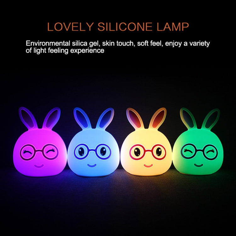 Set of colorful bunny silicone LED lamps with glasses in multiple light colors