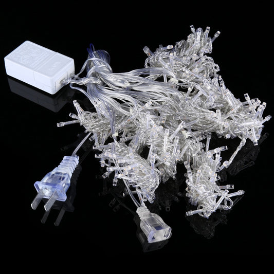 LED curtain string lights with controller box and hanging strands, clear connectors.