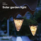 Hanging solar garden lamps with warm glowing clear cones, multiple lights